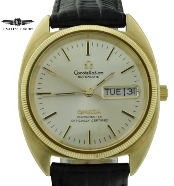 omega constellation day date gold shell